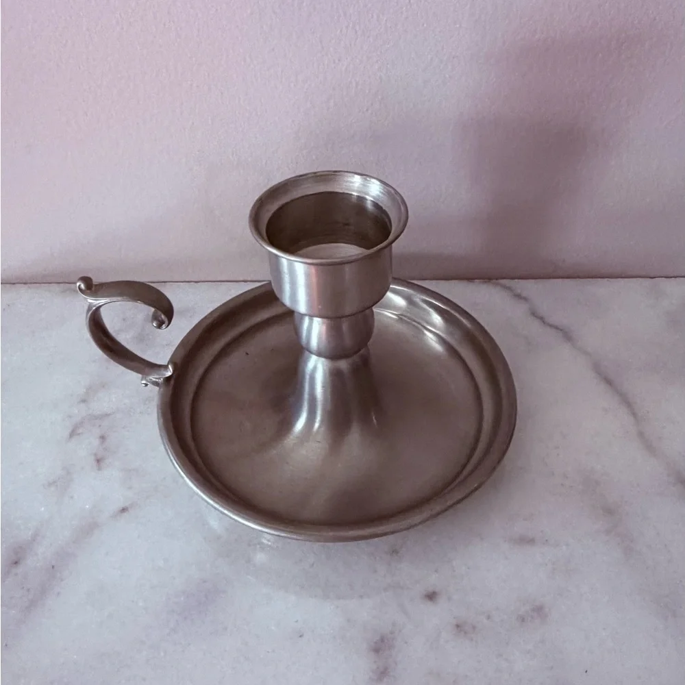an Early American Pewter by Web chamberstick candle holder